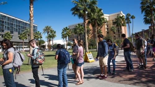 students line up to vote on ASU campus